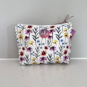 Flowers on the back of Hare Make-Up Bag