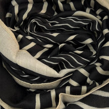 Black and cream maze monogram scarf rolled up