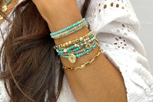 Mystical Turquoise Bracelet on Wrist with Other Bracelets