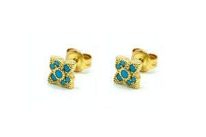 Close up of Turquoise Takia Gold Stud Earrings